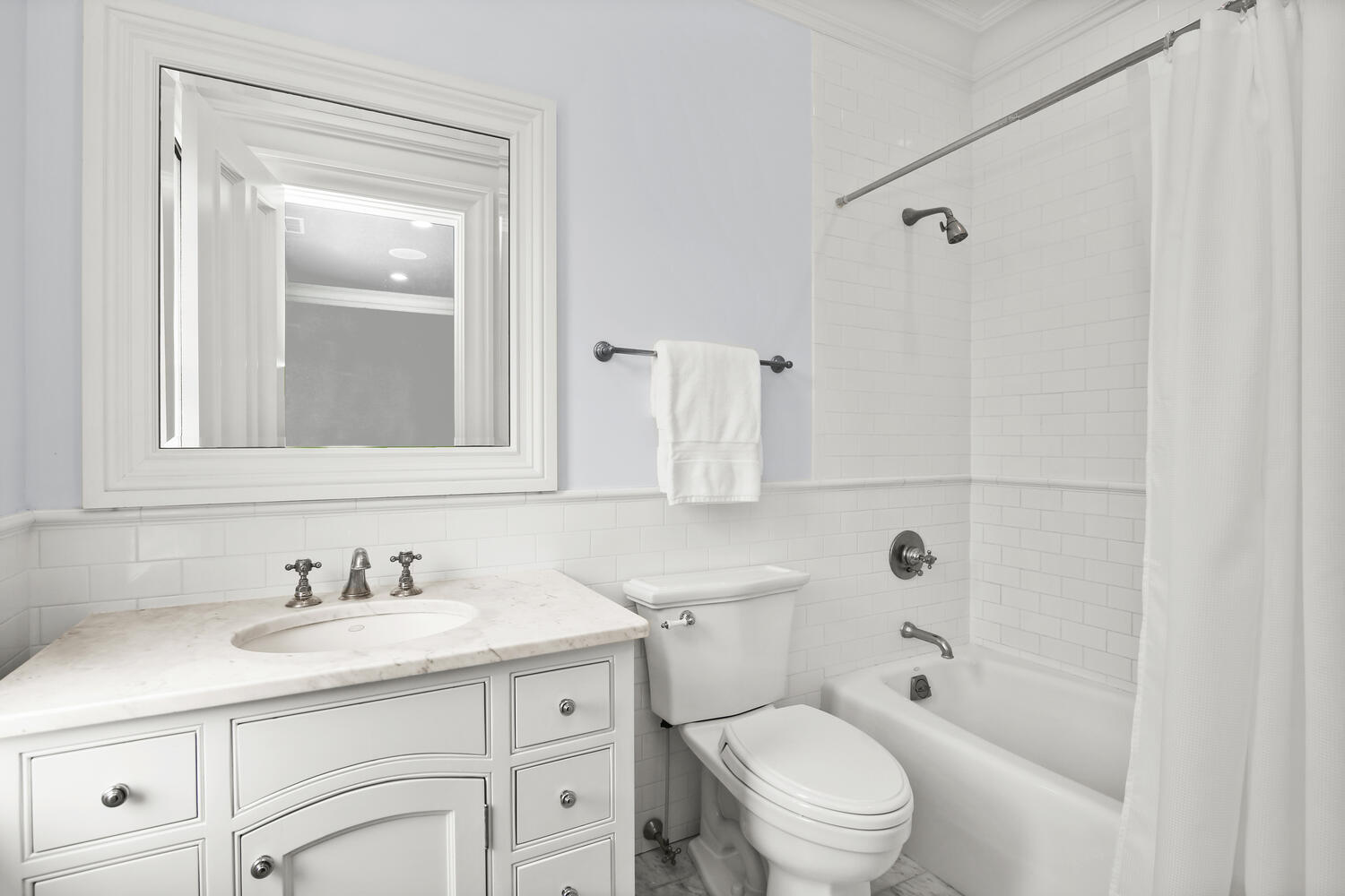 363 West Road New Canaan, CT 06840 - Photo 35 of 68 a bathroom with a granite countertop sink a toilet and shower