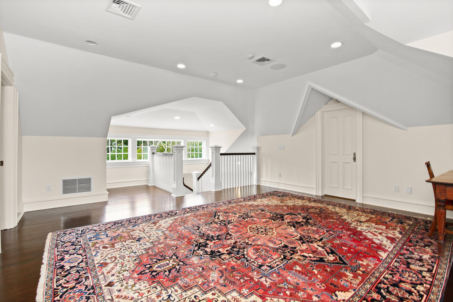 363 West Road New Canaan, CT 06840 - Photo 41 of 68 a large bedroom with a bed and a large window