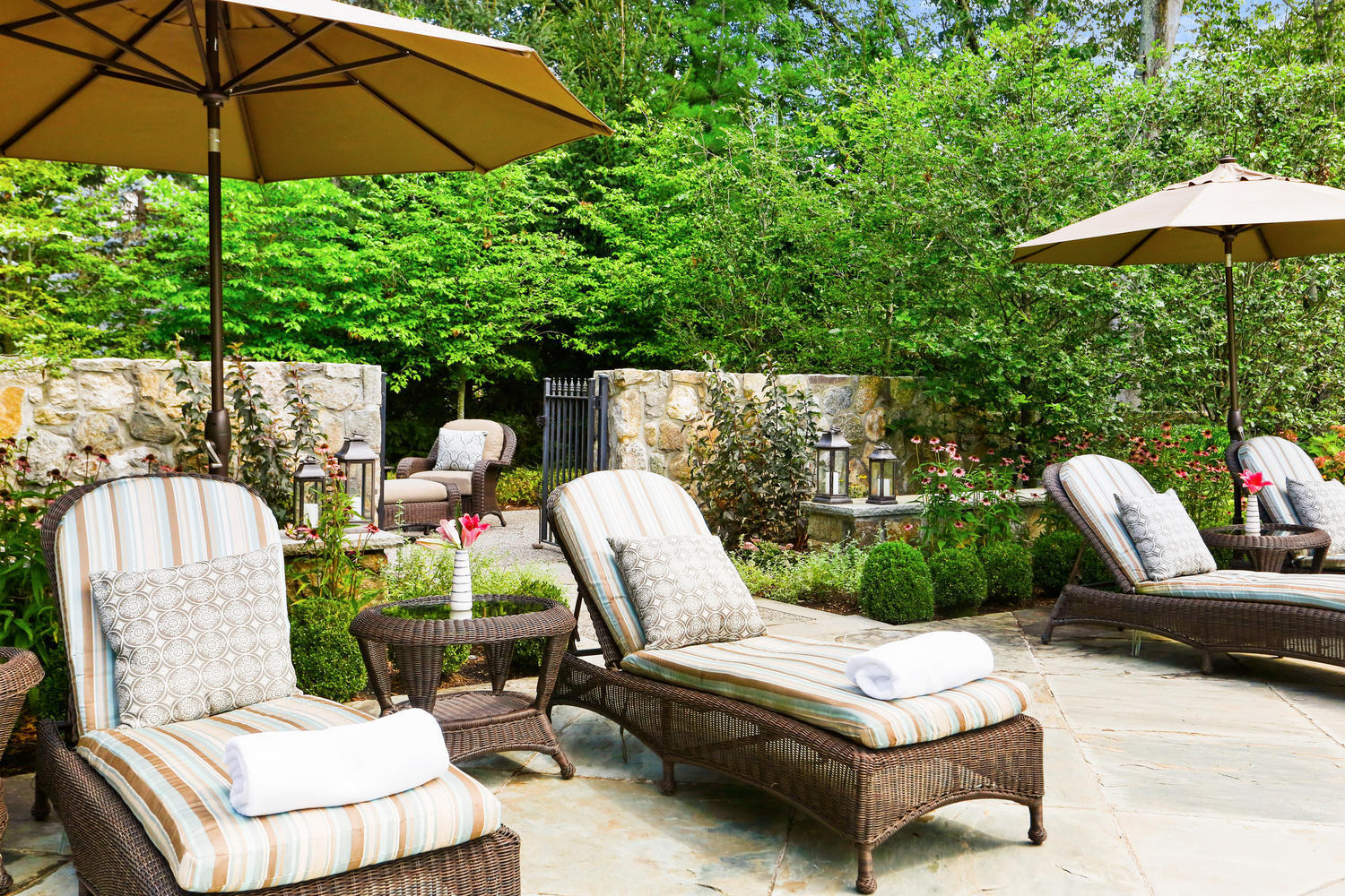 363 West Road New Canaan, CT 06840 - Photo 55 of 68 a view of a patio with furniture and a umbrella