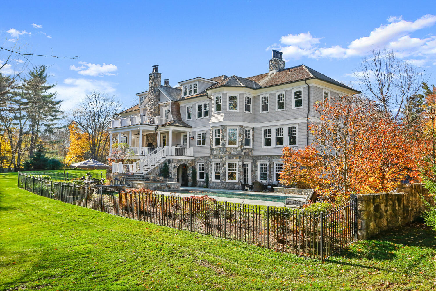 363 West Road New Canaan, CT 06840 - Photo 62 of 68 a view of house with a yard