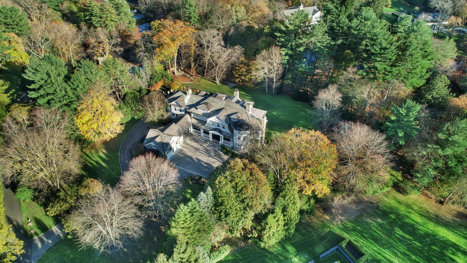 363 West Road New Canaan, CT 06840 - Photo 64 of 68 an aerial view of residential house with outdoor space and trees all around