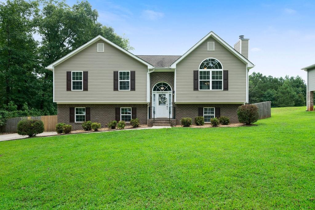 1394 Rainey Road Temple, GA 30179 - Photo 1 of 1 a view of a house with a yard