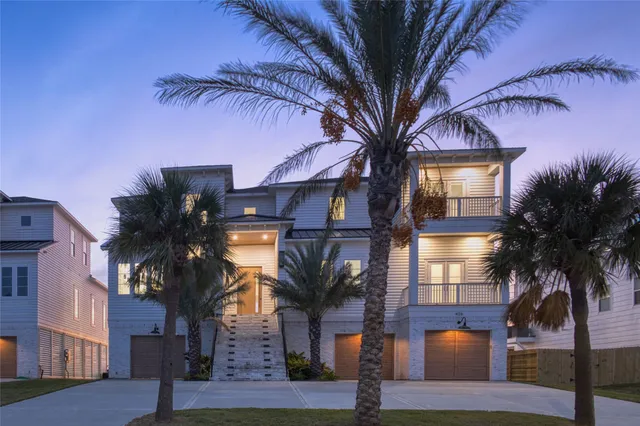 a view of a house with a tree