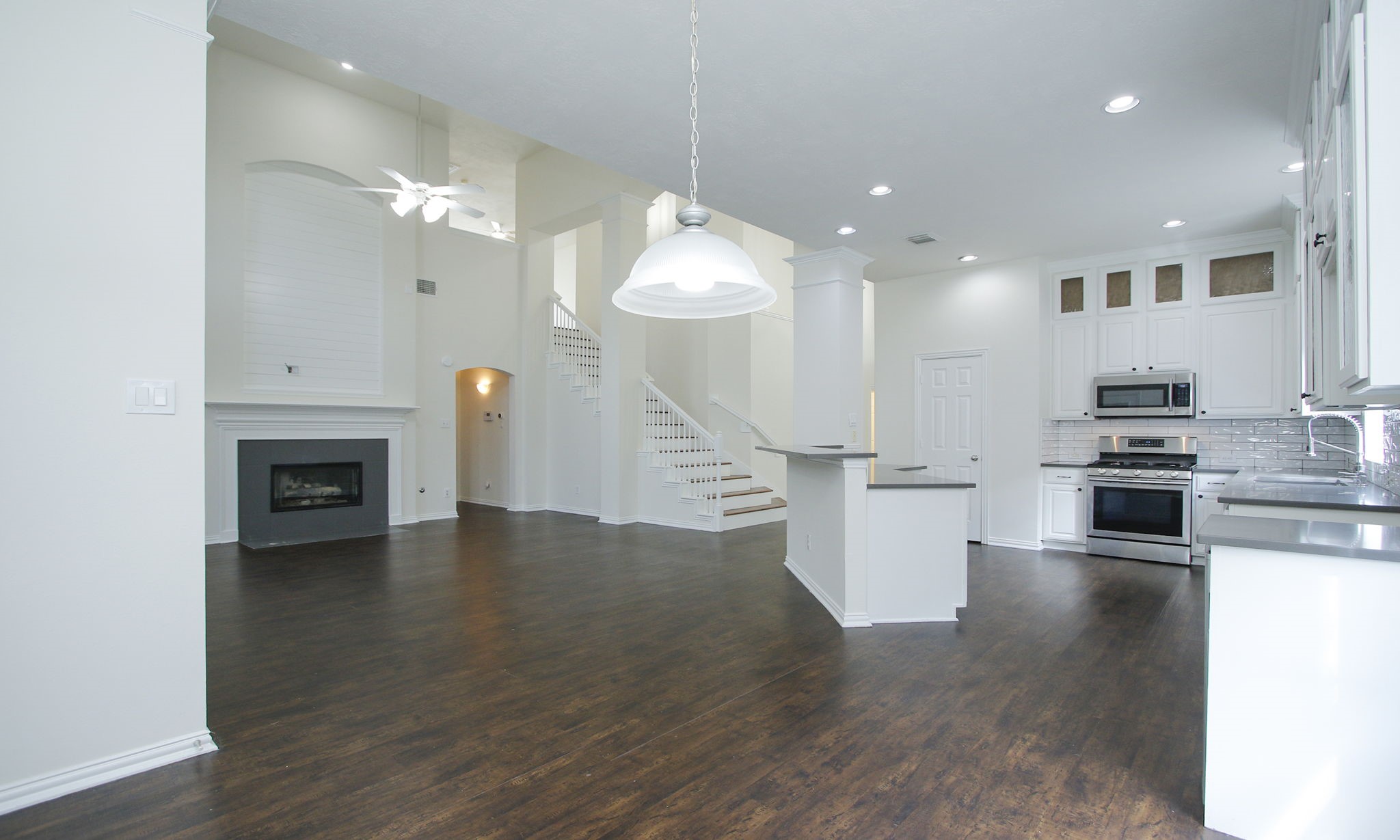 1210 Berwick Manor Court Spring, TX 77379 - Photo 27 of 50 a view of a kitchen with furniture and wooden floor
