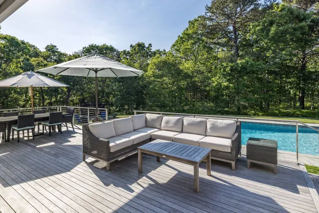 a terrace view with sitting space and trees