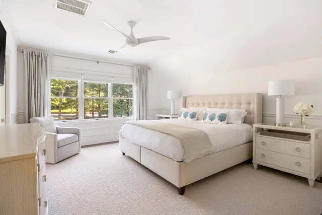 a bed room with a bed and a couch