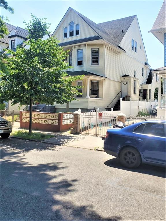 464 East 26th Street Brooklyn, NY 11226 - Photo 3 of 3 a front view of a house with garage