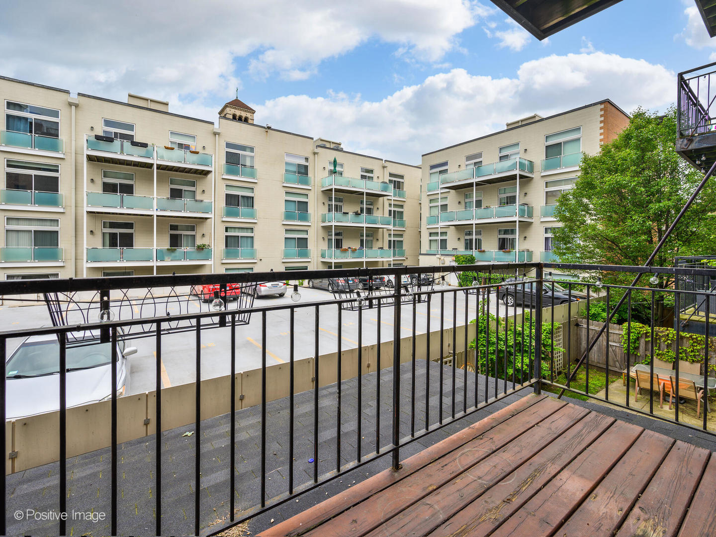 4144 North Sheridan Road, Unit 203 Chicago, IL 60613 - Photo 13 of 15 a view of a large building from a balcony