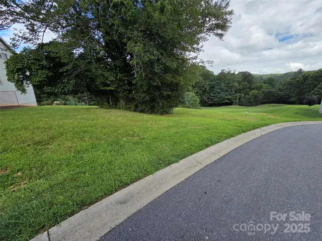 a view of a garden and basketball court