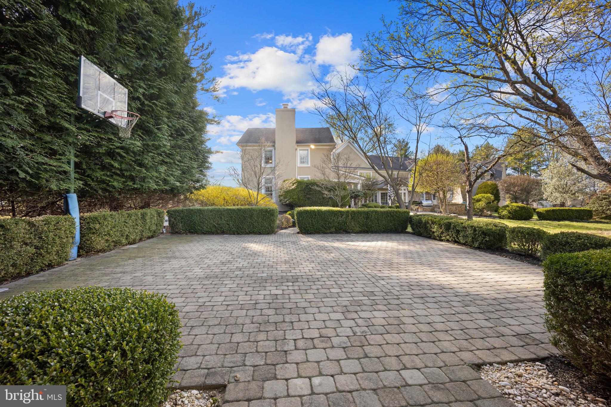 734 Northbrook Road Kennett Square, PA 19348 - Photo 14 of 89 a front view of a house with a yard and a garden