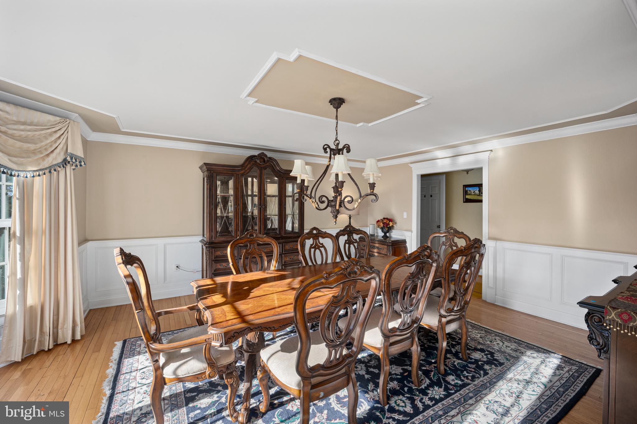734 Northbrook Road Kennett Square, PA 19348 - Photo 22 of 89 a view of a dining room with furniture and wooden floor