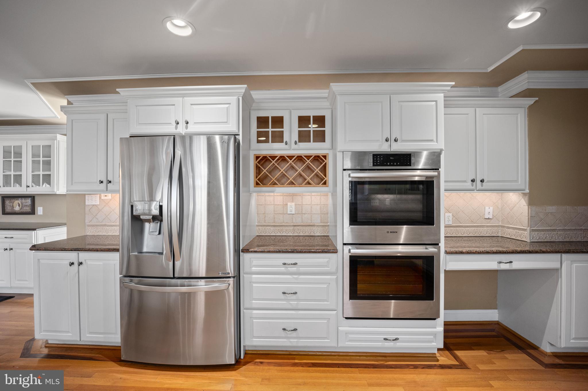 734 Northbrook Road Kennett Square, PA 19348 - Photo 26 of 89 a kitchen with stainless steel appliances a refrigerator and a stove top oven