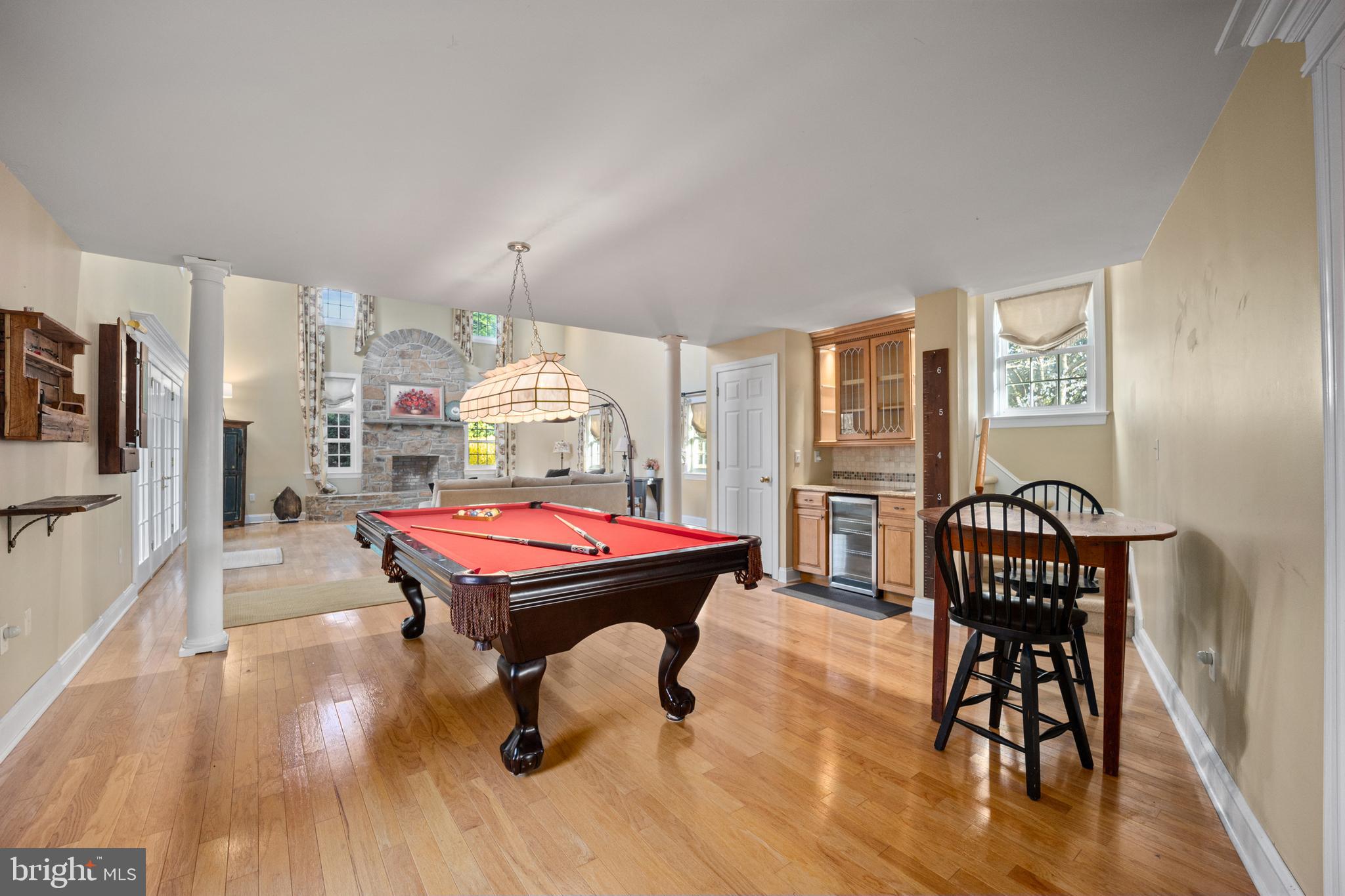 734 Northbrook Road Kennett Square, PA 19348 - Photo 44 of 89 a room with furniture pool table wooden floor and windows