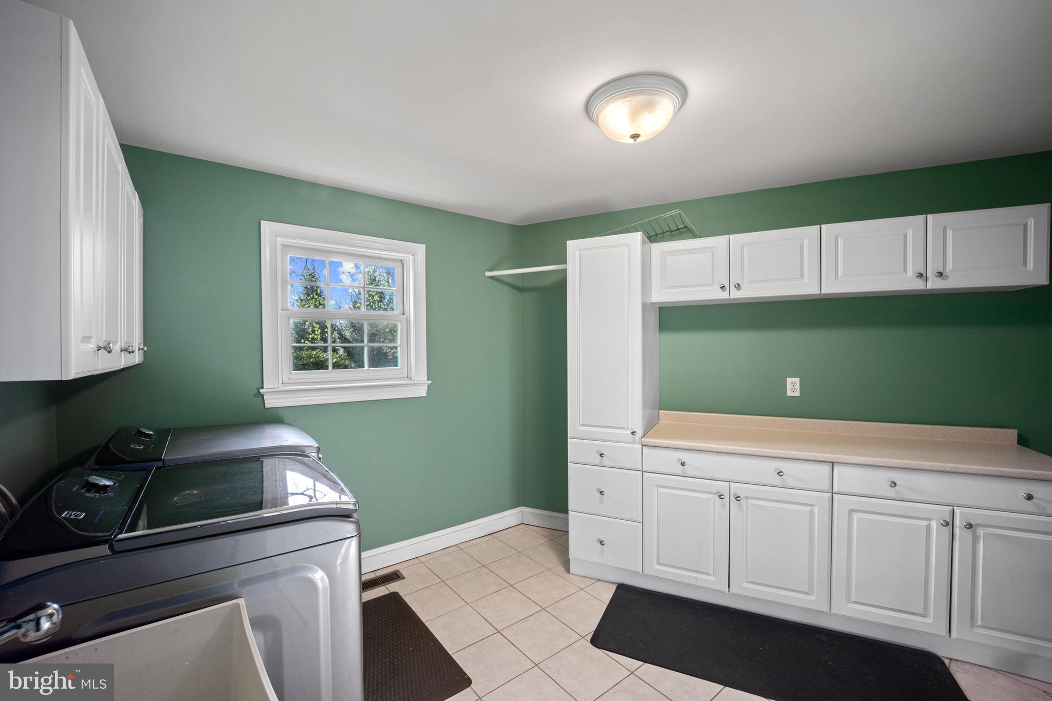 734 Northbrook Road Kennett Square, PA 19348 - Photo 56 of 89 a kitchen with white cabinets a sink and dishwasher