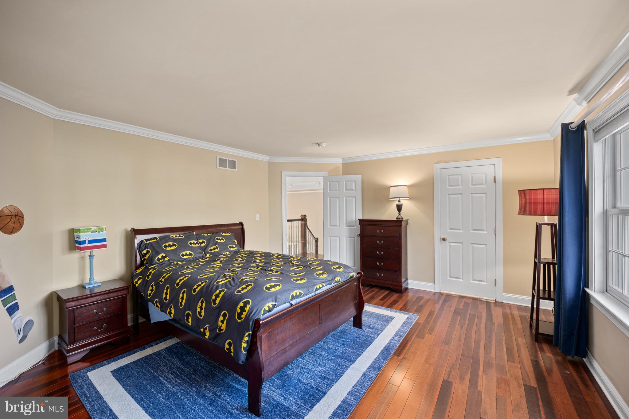 734 Northbrook Road Kennett Square, PA 19348 - Photo 60 of 89 a bedroom with a bed and a wooden floor