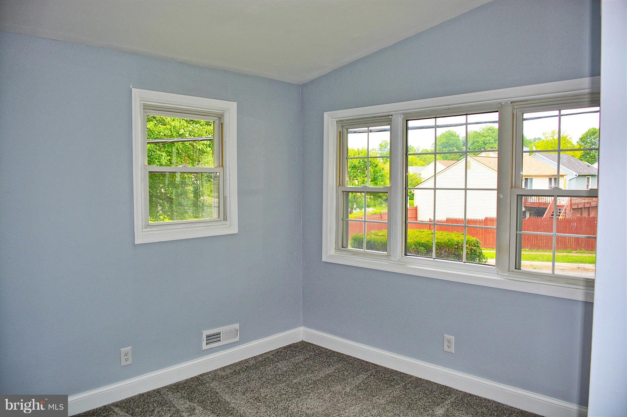 4716 Bonnie Brae Road Baltimore, MD 21208 - Photo 7 of 15 an empty room with a window