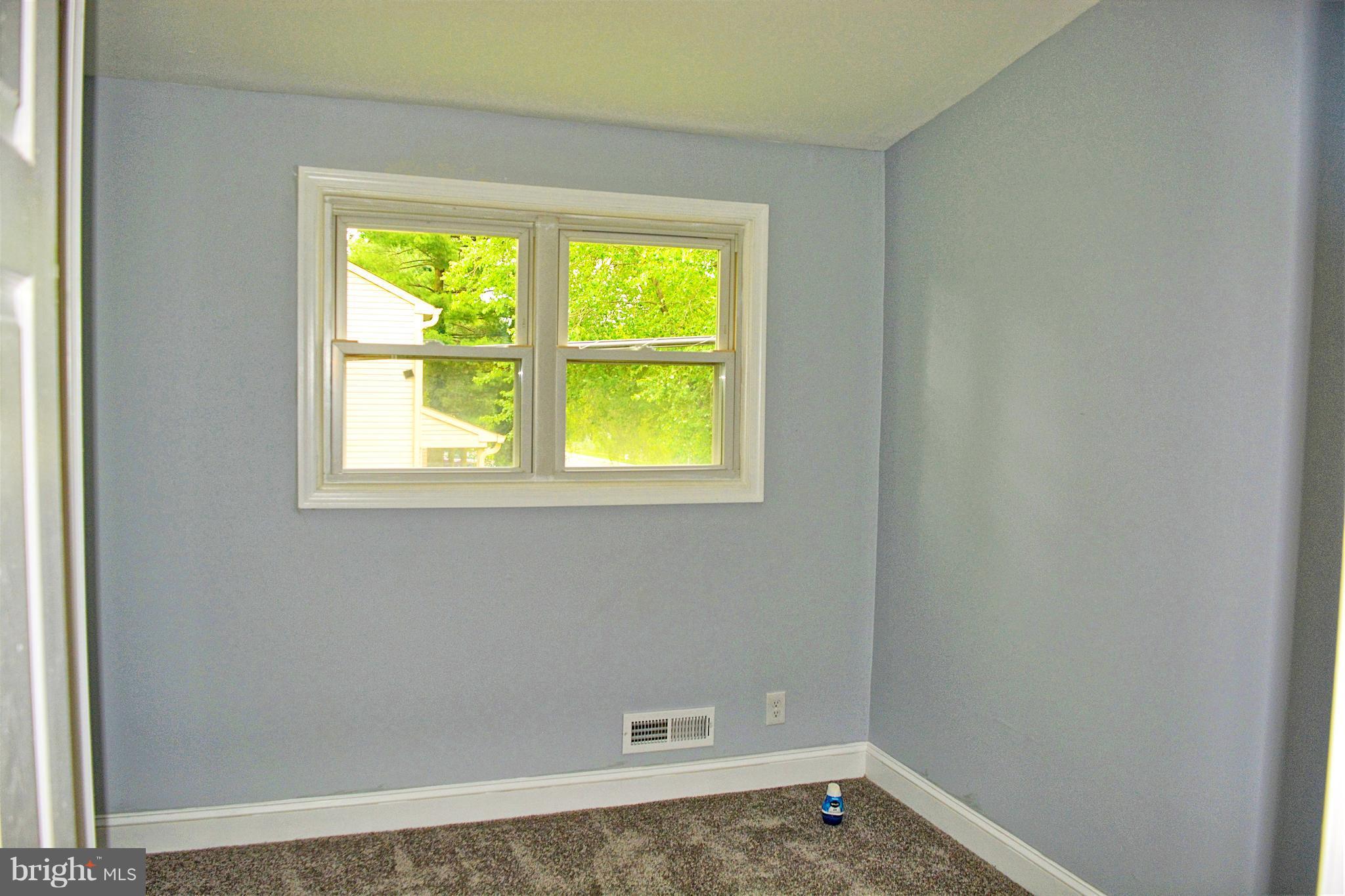 4716 Bonnie Brae Road Baltimore, MD 21208 - Photo 8 of 15 a view of a small space with a window