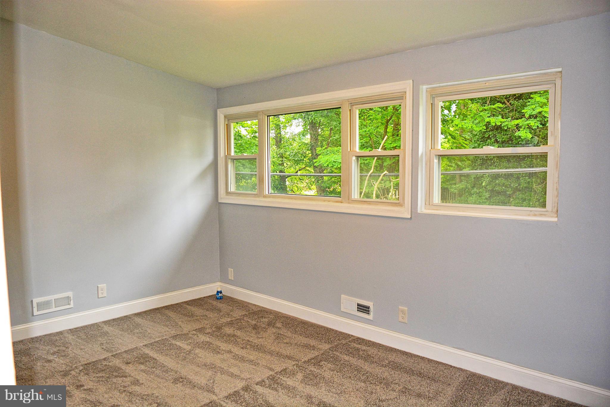 4716 Bonnie Brae Road Baltimore, MD 21208 - Photo 9 of 15 an empty room with a window