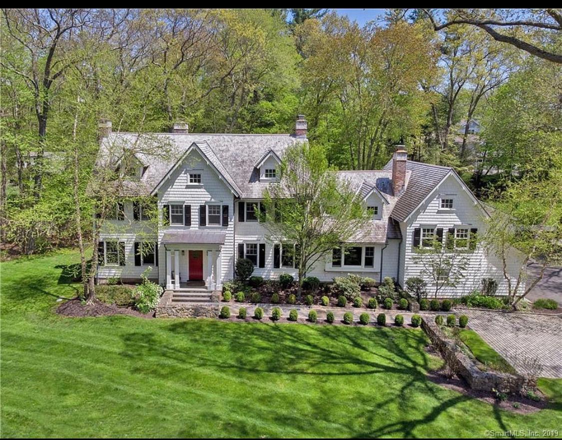 57 Rilling Ridge New Canaan, CT 06840 - Photo 1 of 68 a aerial view of a house with a yard table and chairs