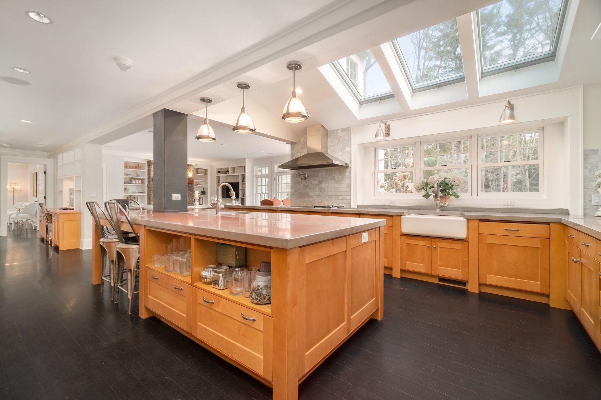 57 Rilling Ridge New Canaan, CT 06840 - Photo 13 of 68 a large white kitchen with a large window