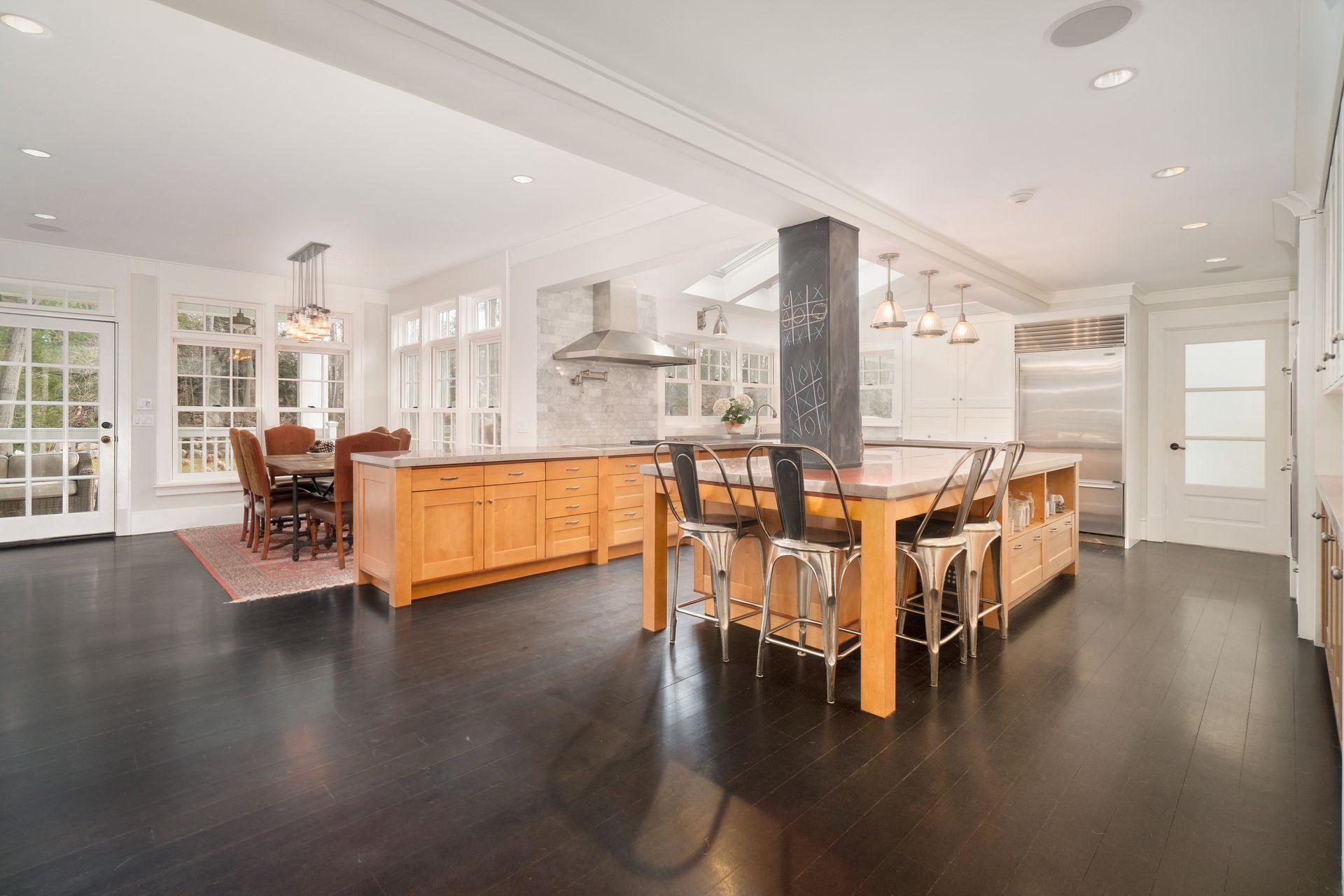 57 Rilling Ridge New Canaan, CT 06840 - Photo 19 of 68 a view of a dining room with furniture and floor to ceiling window