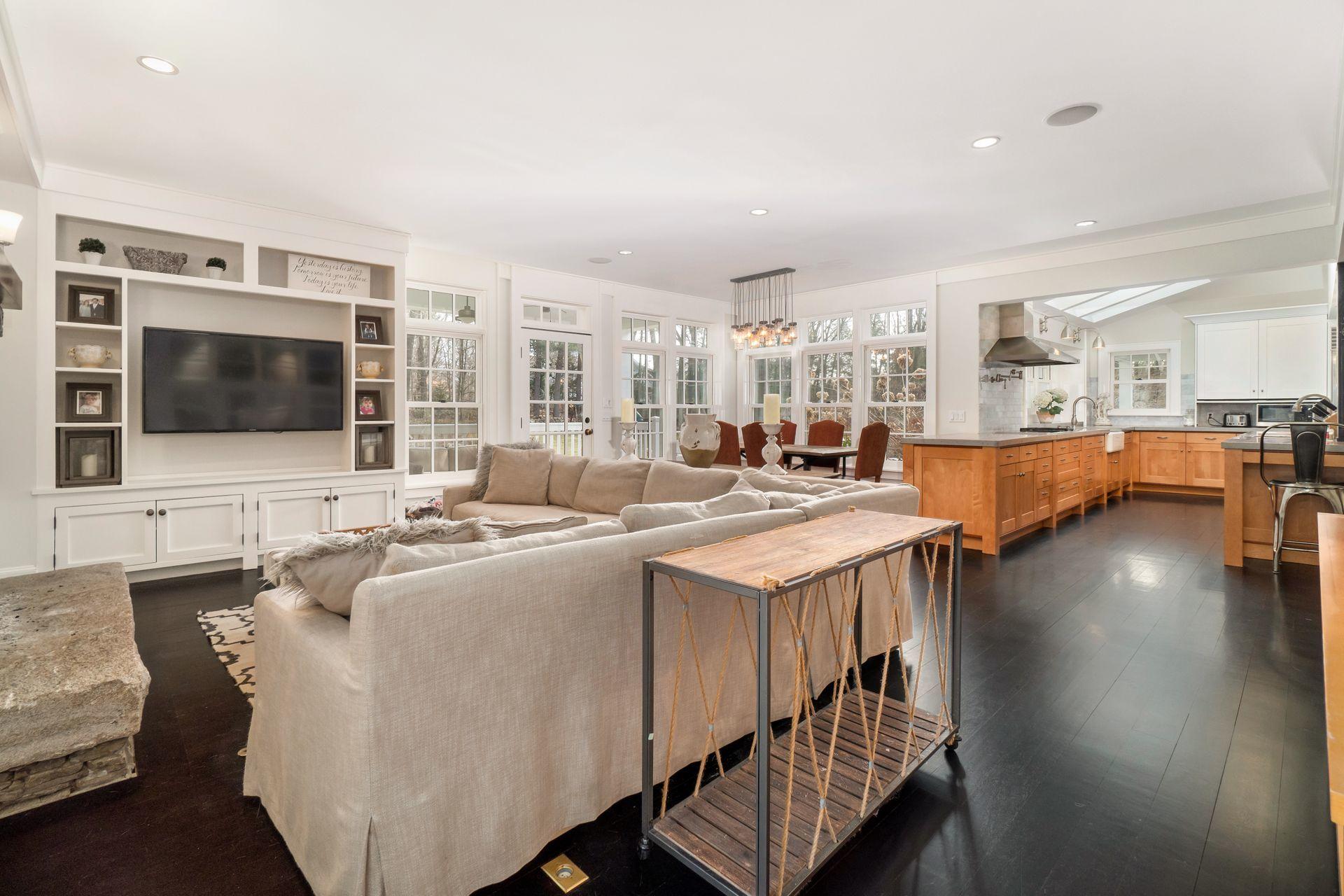 57 Rilling Ridge New Canaan, CT 06840 - Photo 23 of 68 a living room with stainless steel appliances furniture and a flat screen tv