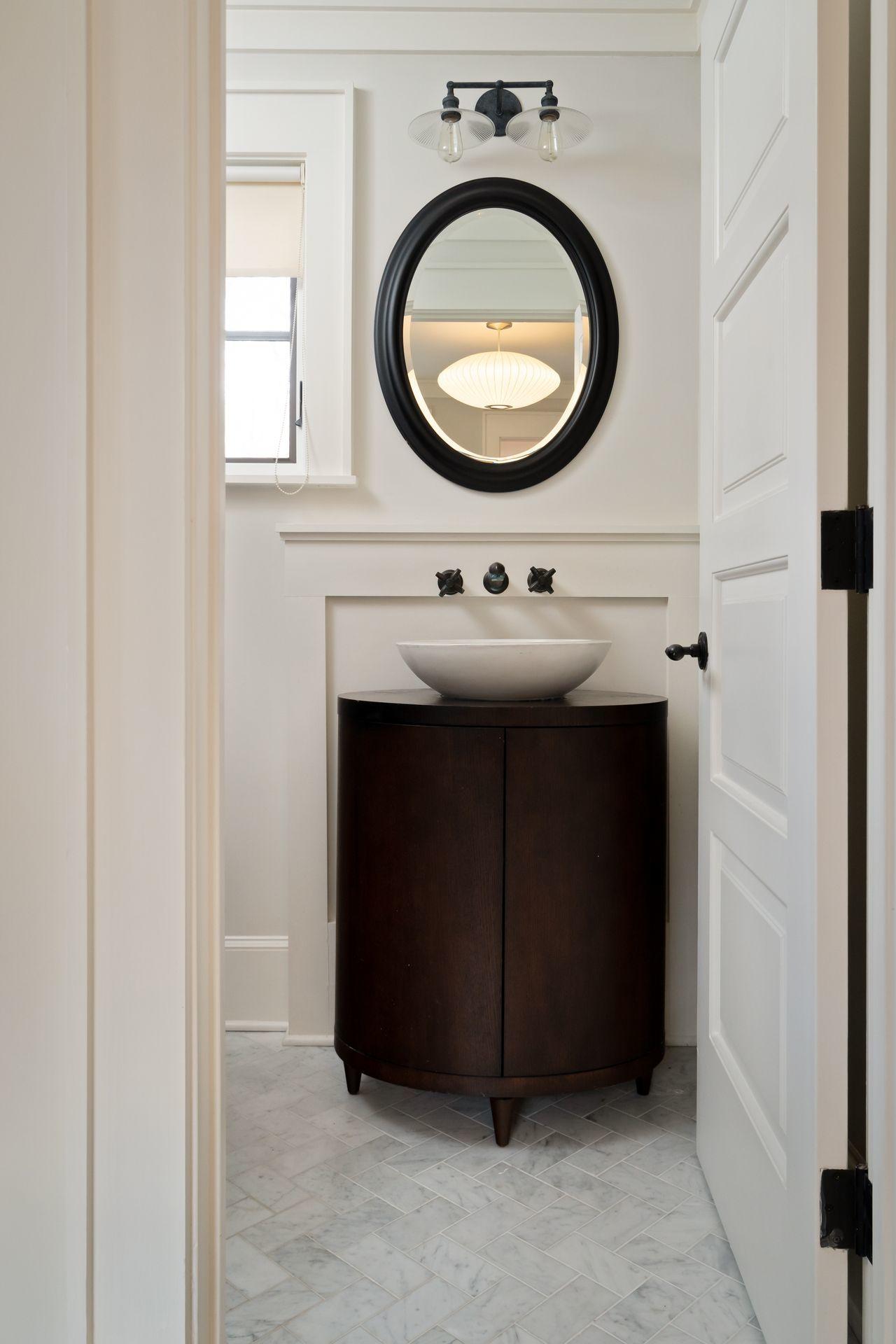 57 Rilling Ridge New Canaan, CT 06840 - Photo 27 of 68 a bathroom with a sink and a mirror