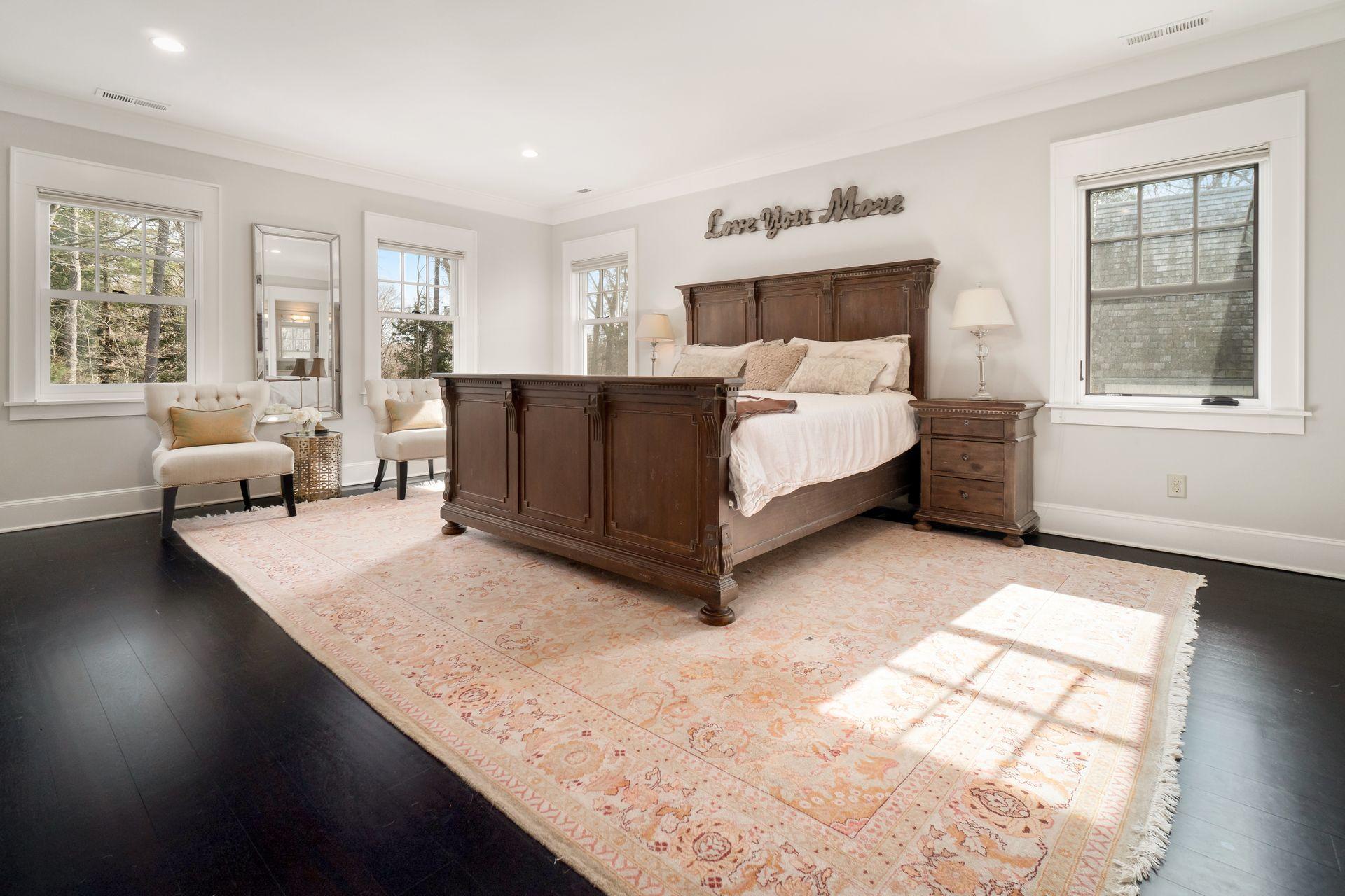 57 Rilling Ridge New Canaan, CT 06840 - Photo 30 of 68 a bed room with a bed and wooden floor