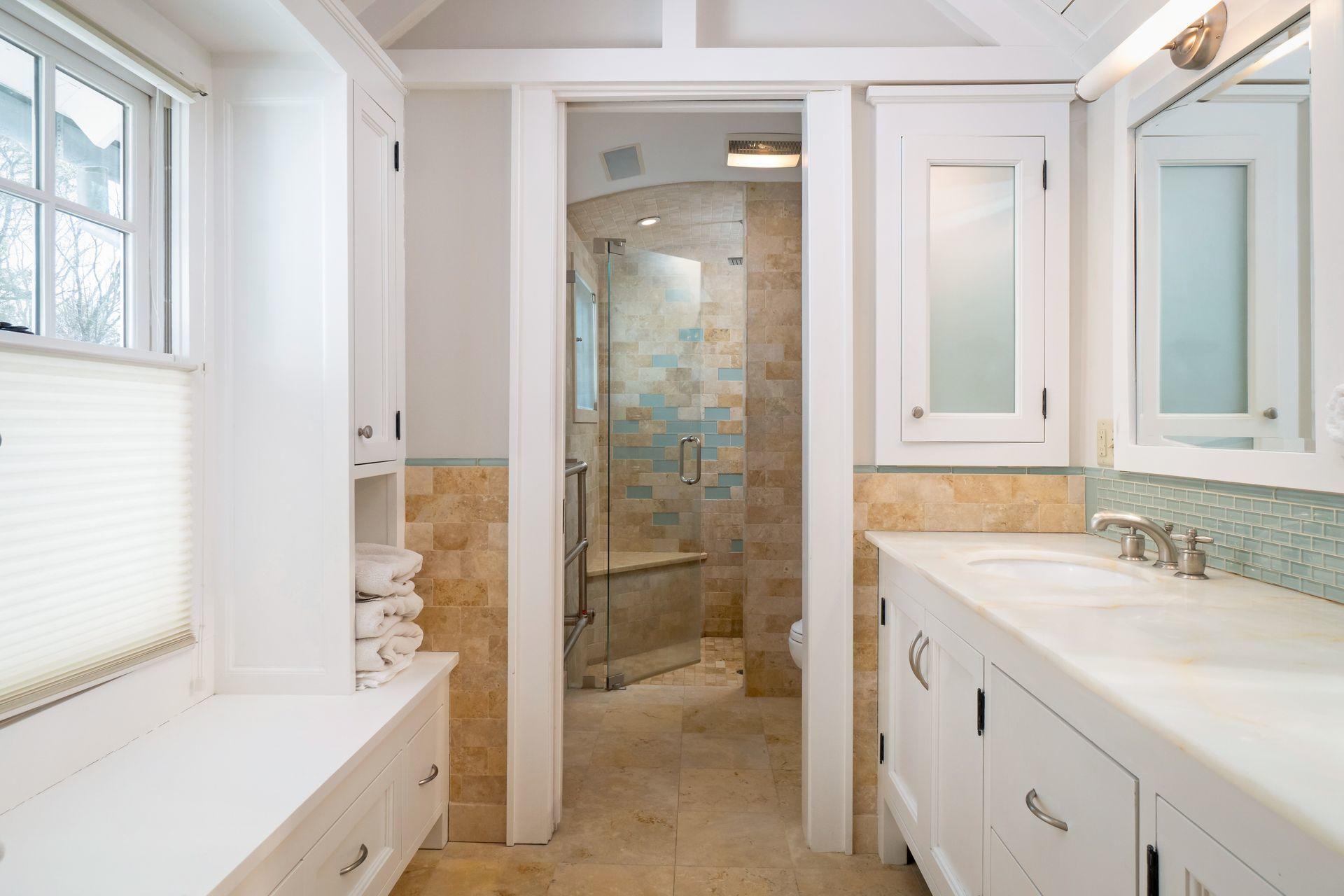 57 Rilling Ridge New Canaan, CT 06840 - Photo 31 of 68 a bathroom with a tub sink and mirror