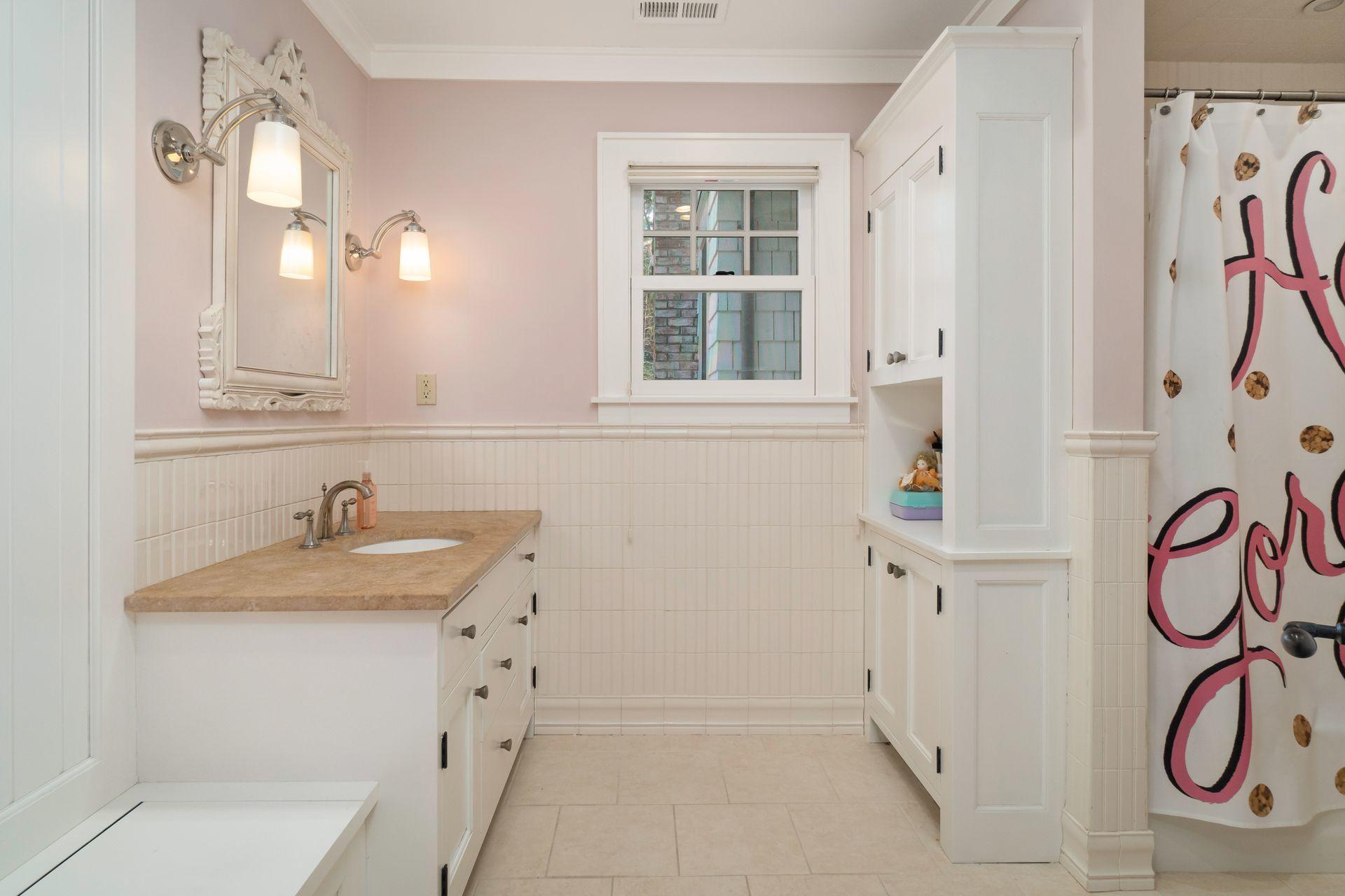 57 Rilling Ridge New Canaan, CT 06840 - Photo 34 of 68 a bathroom with a sink and a mirror