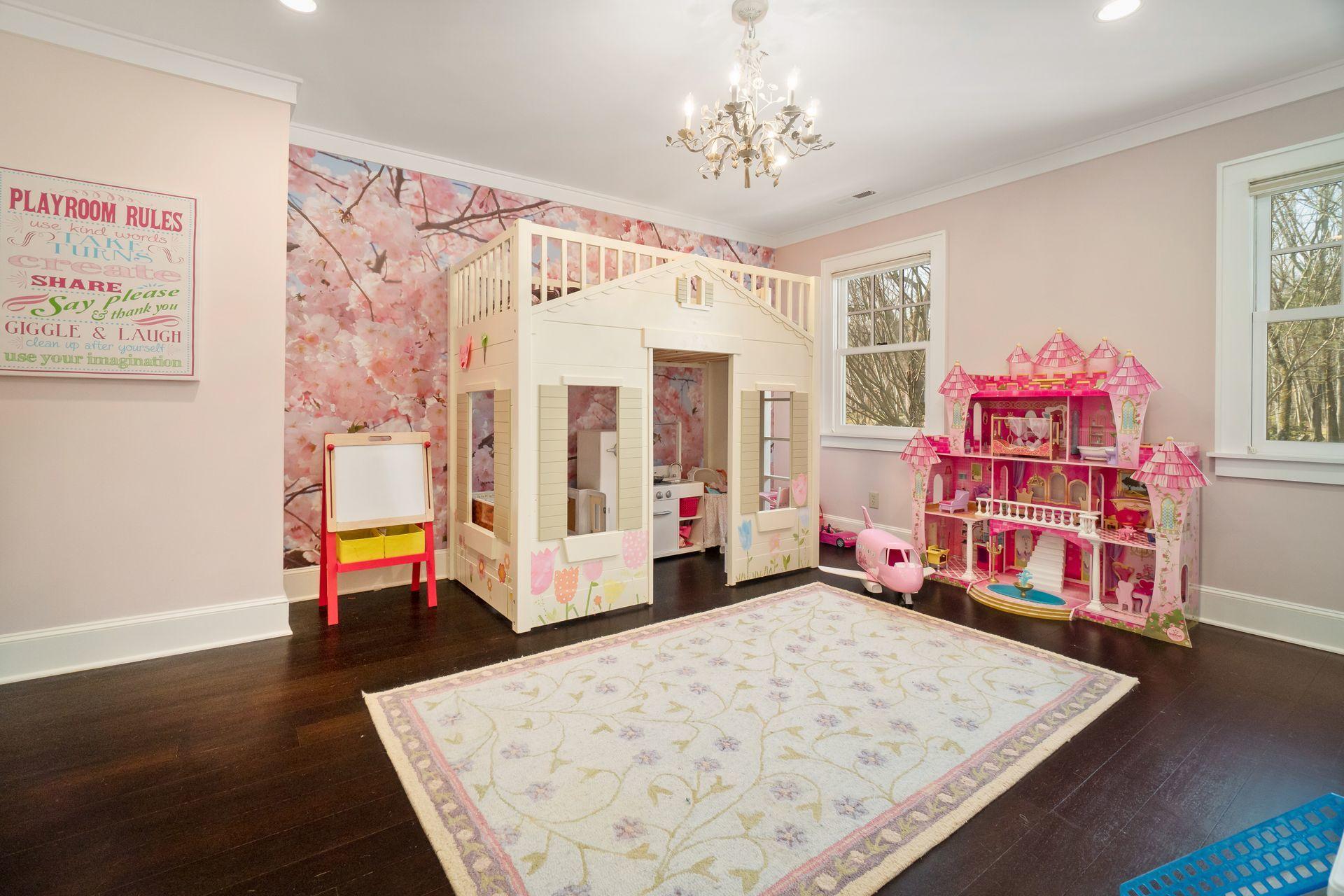 57 Rilling Ridge New Canaan, CT 06840 - Photo 37 of 68 a living room with baby crib furniture and a window