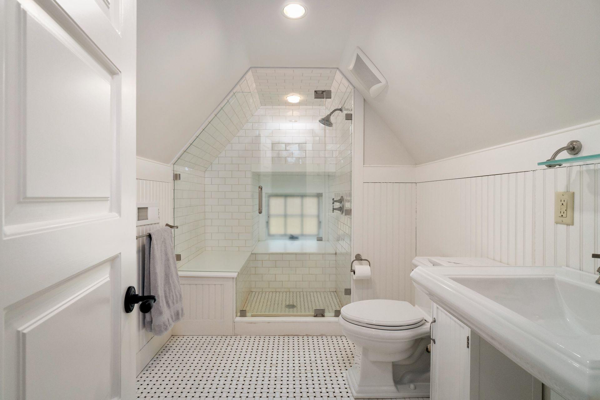 57 Rilling Ridge New Canaan, CT 06840 - Photo 41 of 68 a bathroom with a sink toilet vanity and shower