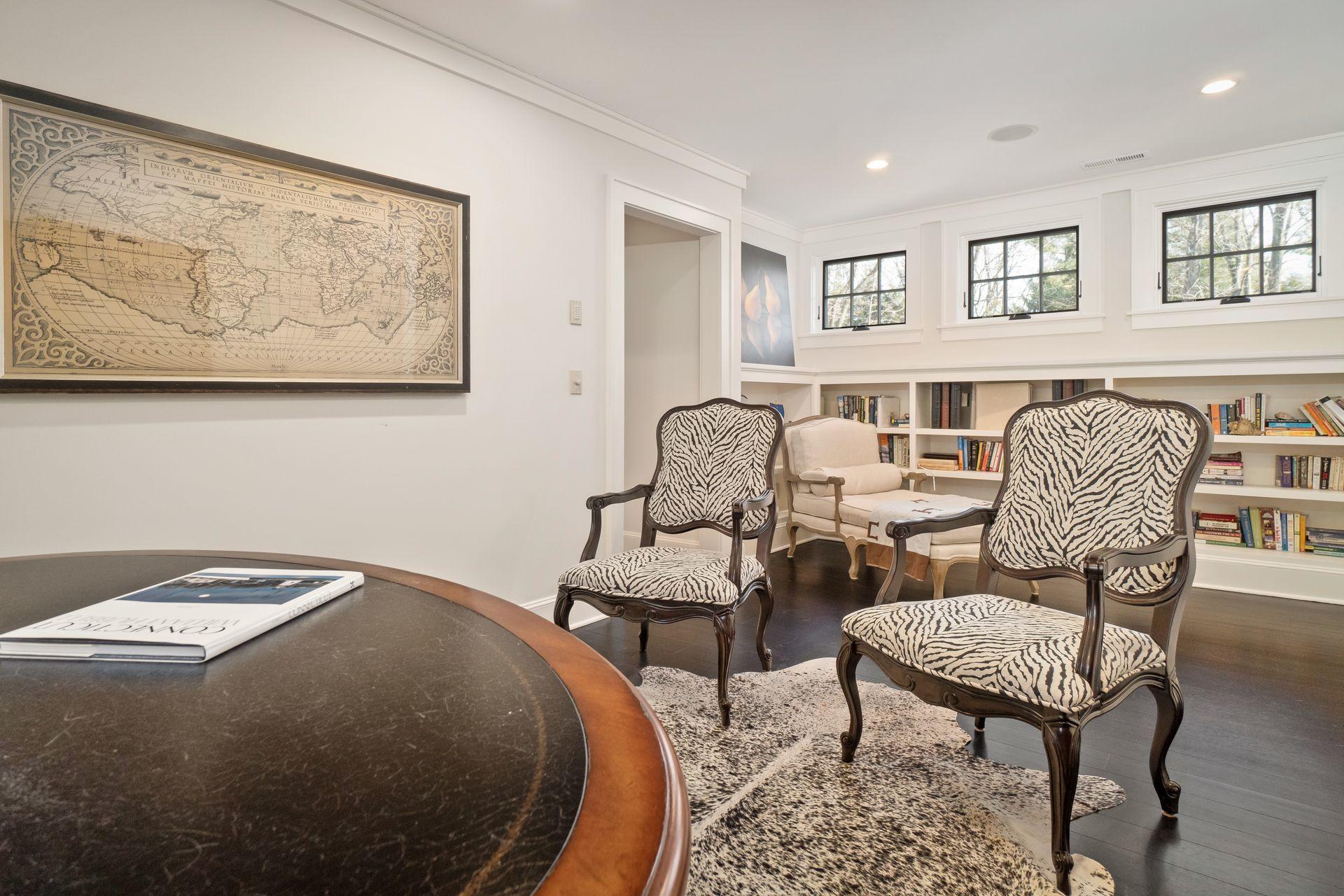 57 Rilling Ridge New Canaan, CT 06840 - Photo 44 of 68 a living room with furniture and a chair