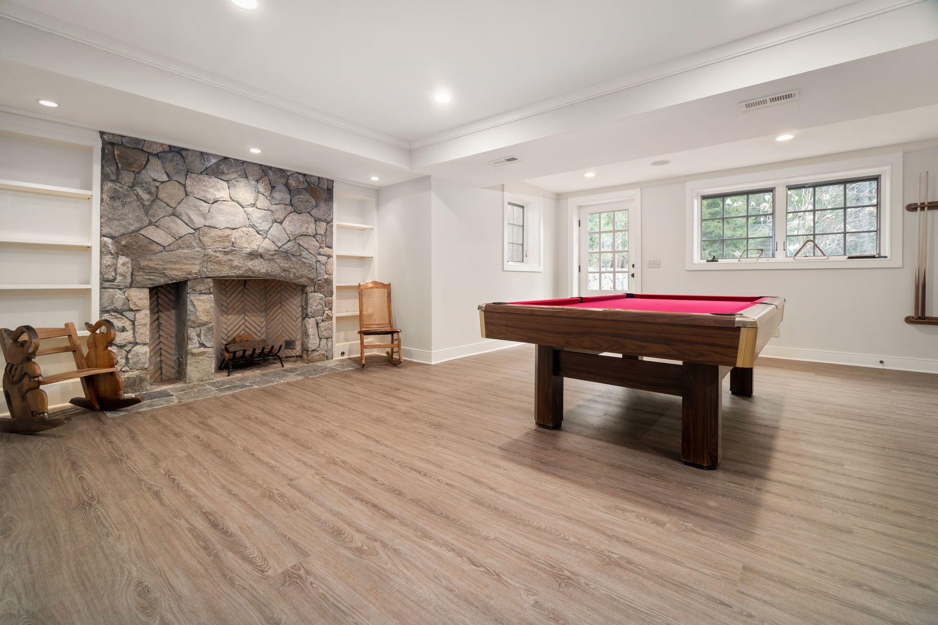 57 Rilling Ridge New Canaan, CT 06840 - Photo 47 of 68 a room with furniture and a fireplace