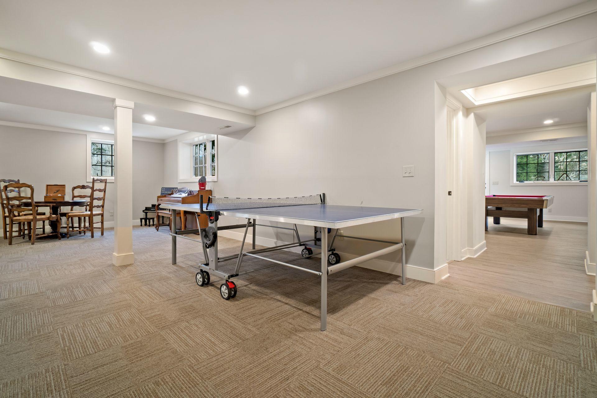 57 Rilling Ridge New Canaan, CT 06840 - Photo 52 of 68 a view of a livingroom with furniture and windows