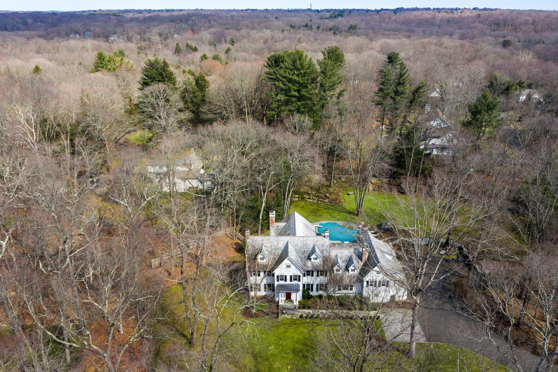 57 Rilling Ridge New Canaan, CT 06840 - Photo 58 of 68 an aerial view of a house with a yard