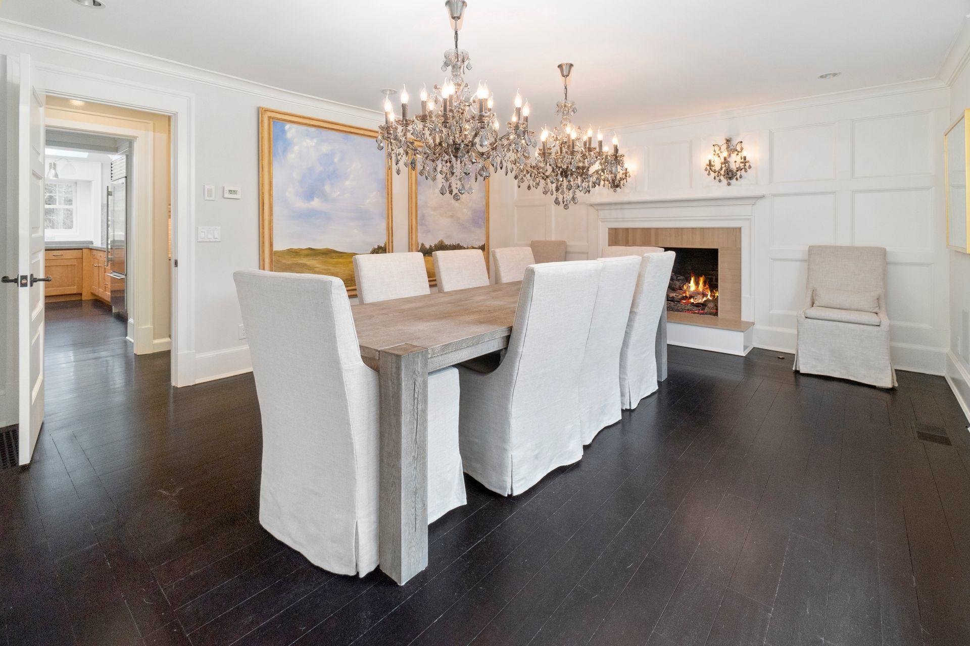57 Rilling Ridge New Canaan, CT 06840 - Photo 9 of 68 a dining room with furniture potted plants and wooden floor