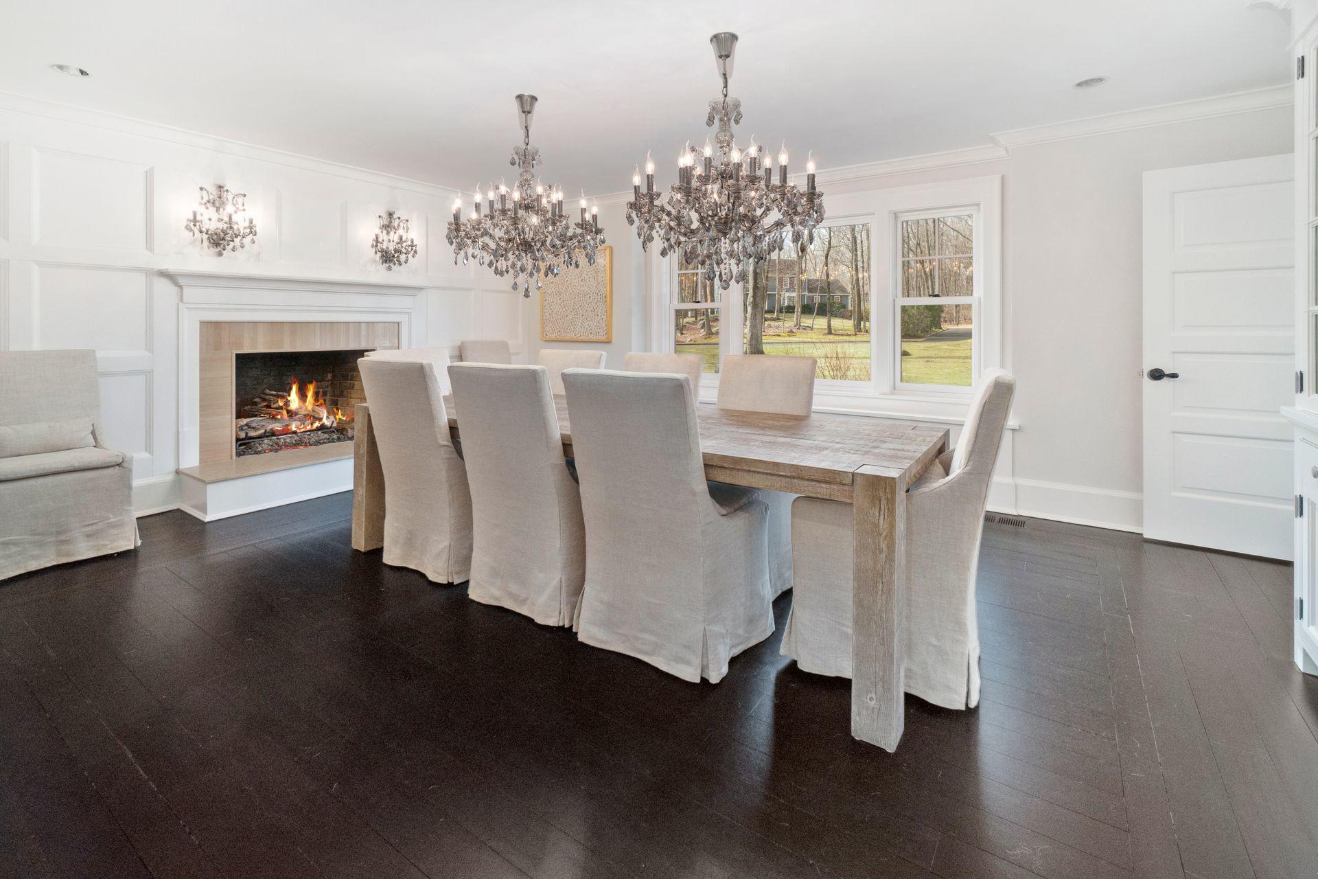 57 Rilling Ridge New Canaan, CT 06840 - Photo 10 of 68 a view of a dining room with furniture wooden floor and chandelier
