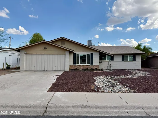 a front view of house with yard