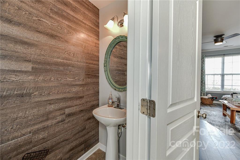 122 Chimney Rock Lane Fort Mill, SC 29708 - Photo 14 of 27 a bathroom with a sink and a mirror