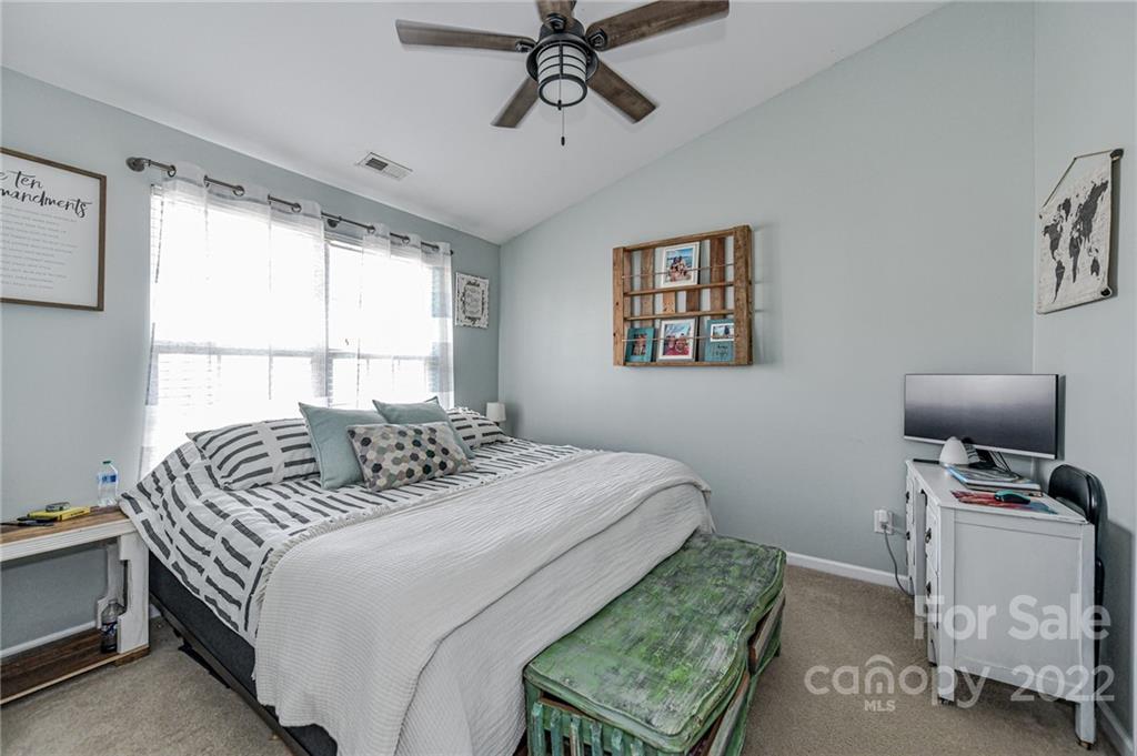 122 Chimney Rock Lane Fort Mill, SC 29708 - Photo 15 of 27 a bedroom with a bed and a window