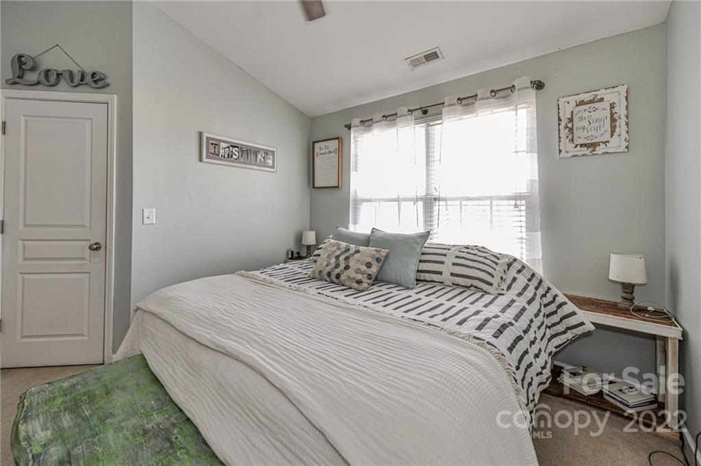 122 Chimney Rock Lane Fort Mill, SC 29708 - Photo 16 of 27 a bedroom with a bed and a window
