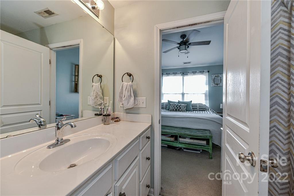 122 Chimney Rock Lane Fort Mill, SC 29708 - Photo 17 of 27 a bathroom with a sink and a mirror