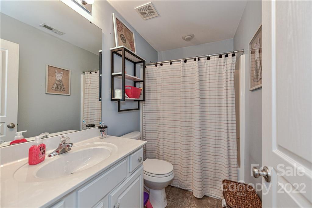 122 Chimney Rock Lane Fort Mill, SC 29708 - Photo 20 of 27 a bathroom with a sink toilet and shower