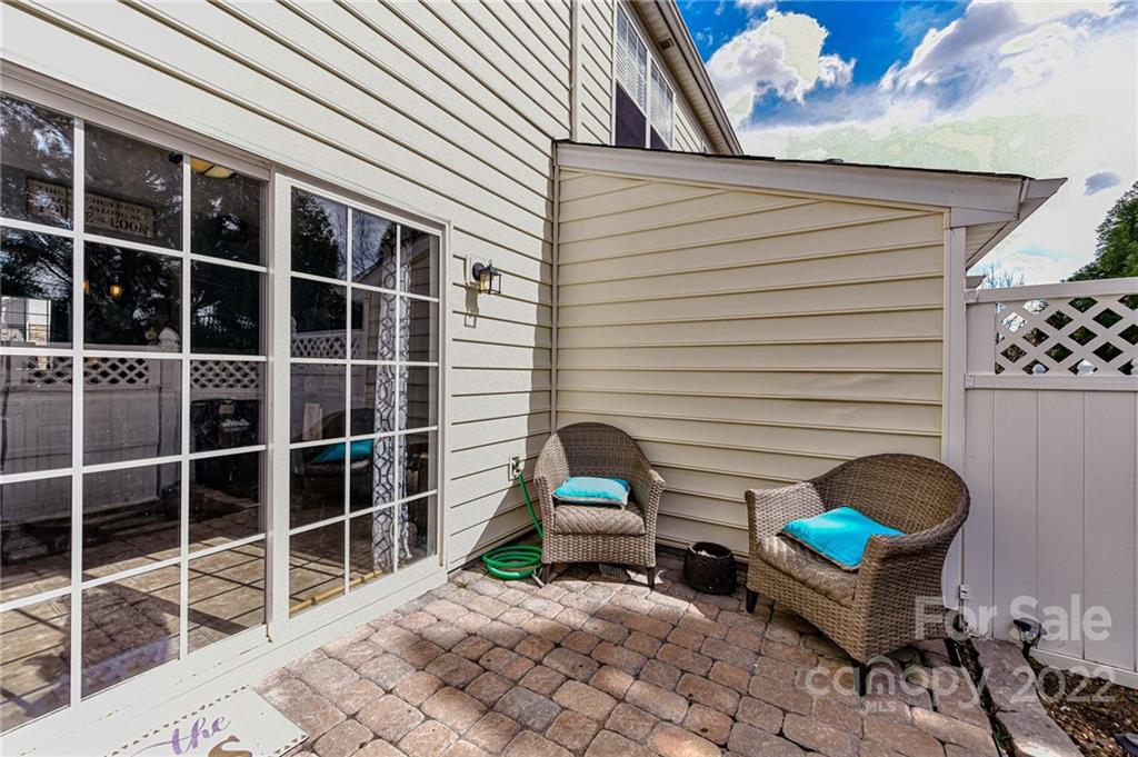 122 Chimney Rock Lane Fort Mill, SC 29708 - Photo 22 of 27 a house view with a sitting space and garden space
