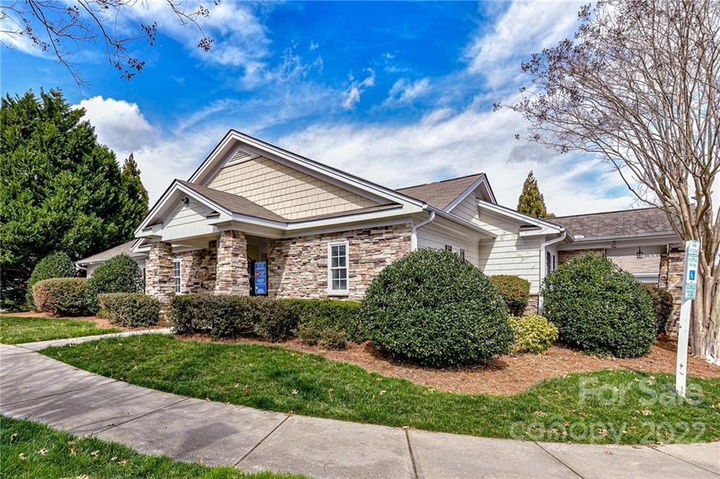 122 Chimney Rock Lane Fort Mill, SC 29708 - Photo 25 of 27 a front view of house with yard and green space