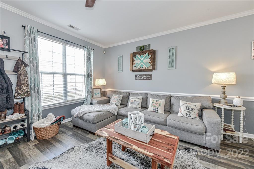 122 Chimney Rock Lane Fort Mill, SC 29708 - Photo 7 of 27 a living room with furniture and a window