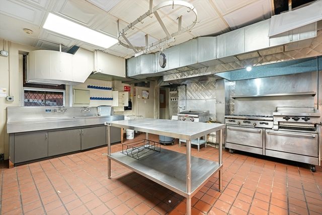 a view of a living room and dining room