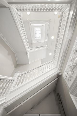 a bath room with a dining table and chairs