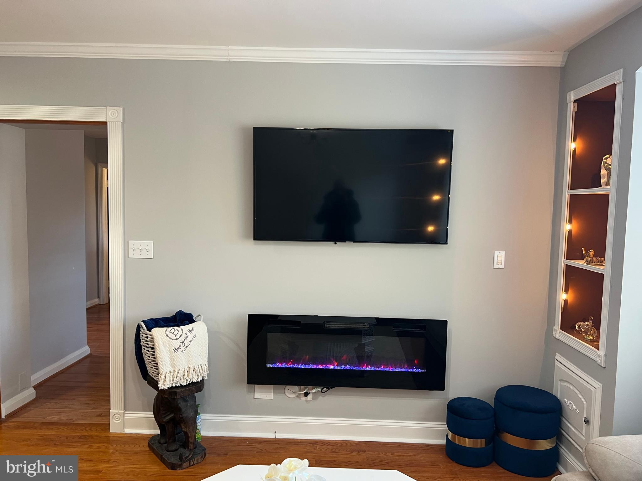 401 Imla Street Baltimore, MD 21224 - Photo 6 of 28 a living room with furniture and a flat screen tv